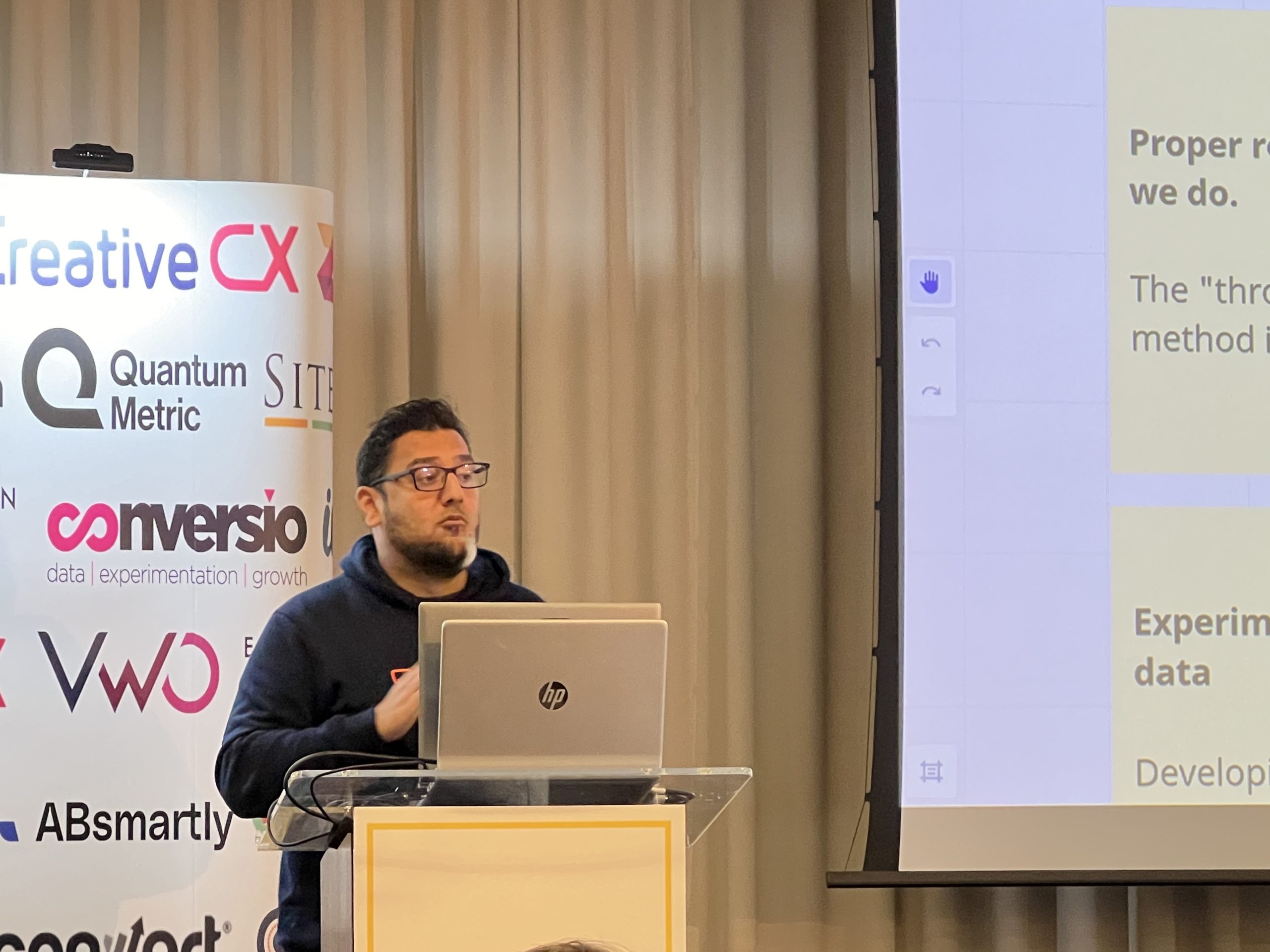 Bhavik Patel delivering his presentation on the past, present and future of CRO.